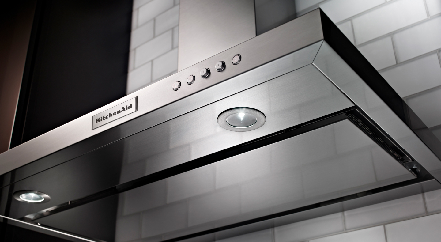 Close-up of underside of KitchenAid® range hood 
