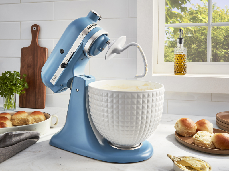 A blue KitchenAid® stand mixer used to make rolls