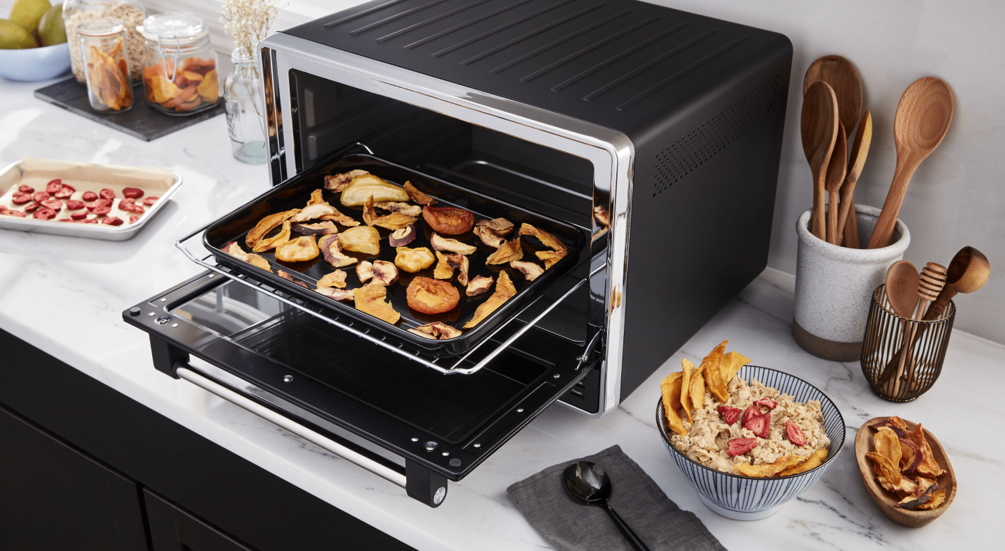 A black KitchenAid® air fryer used to make homemade chips