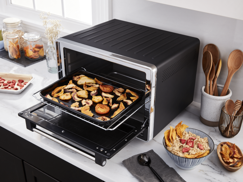 A black KitchenAid® air fryer used to make homemade chips