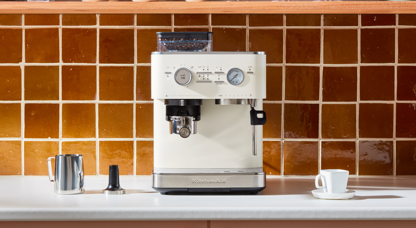 KitchenAid® semi-automatic espresso machine on a kitchen counter 