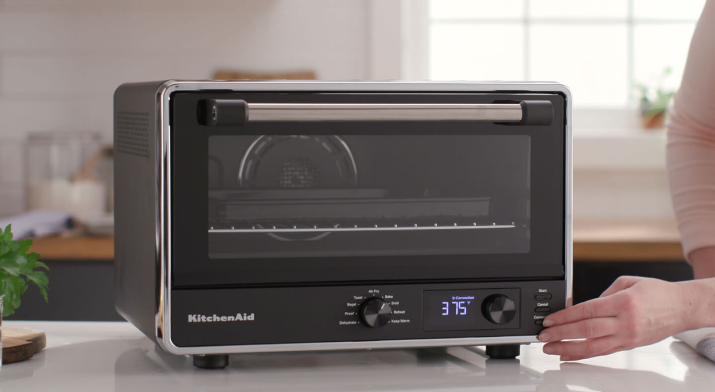 A black KitchenAid® countertop oven