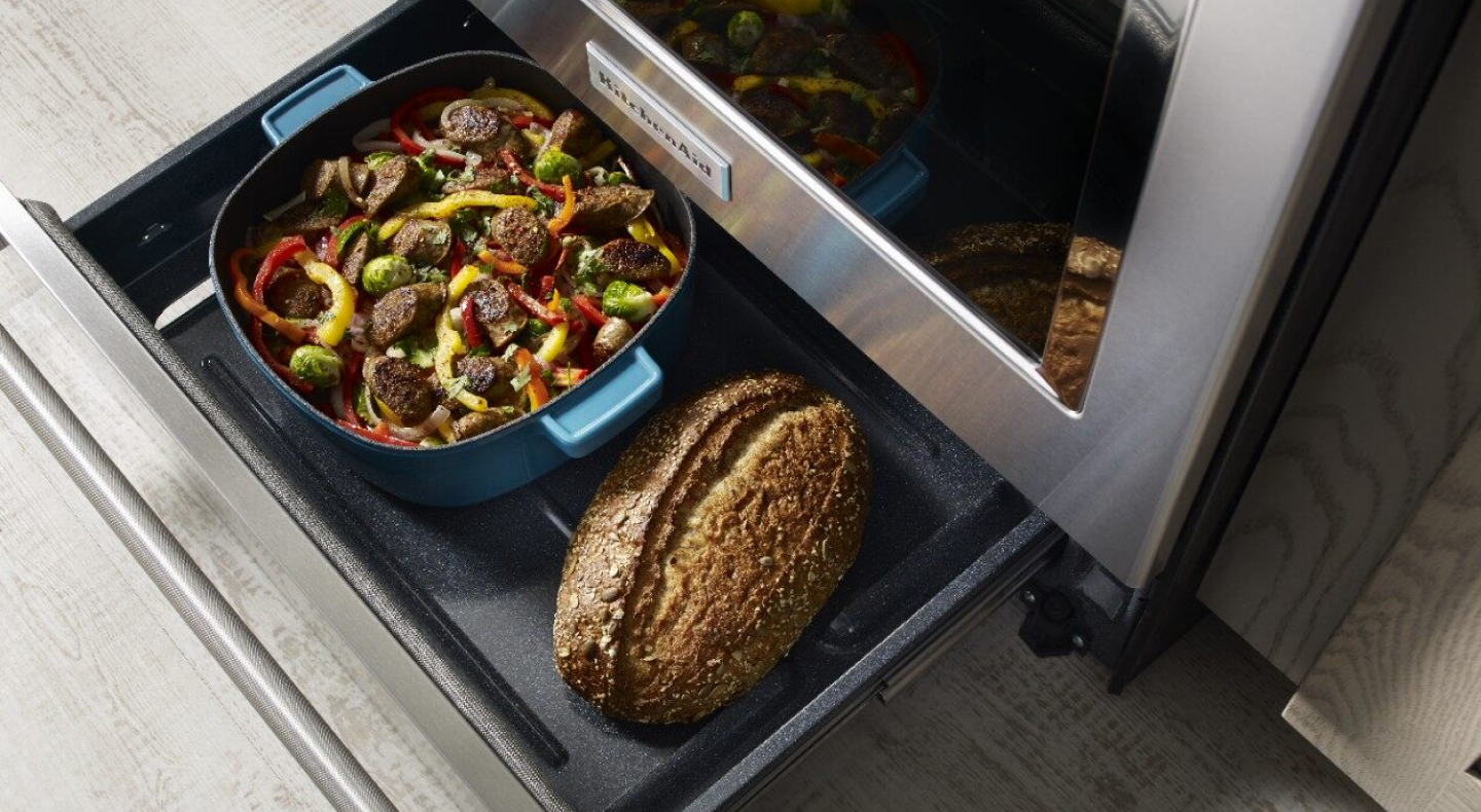 Warming drawer open on a range
