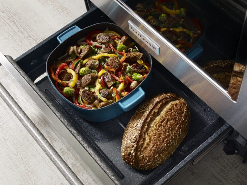 Warming drawer open on a range