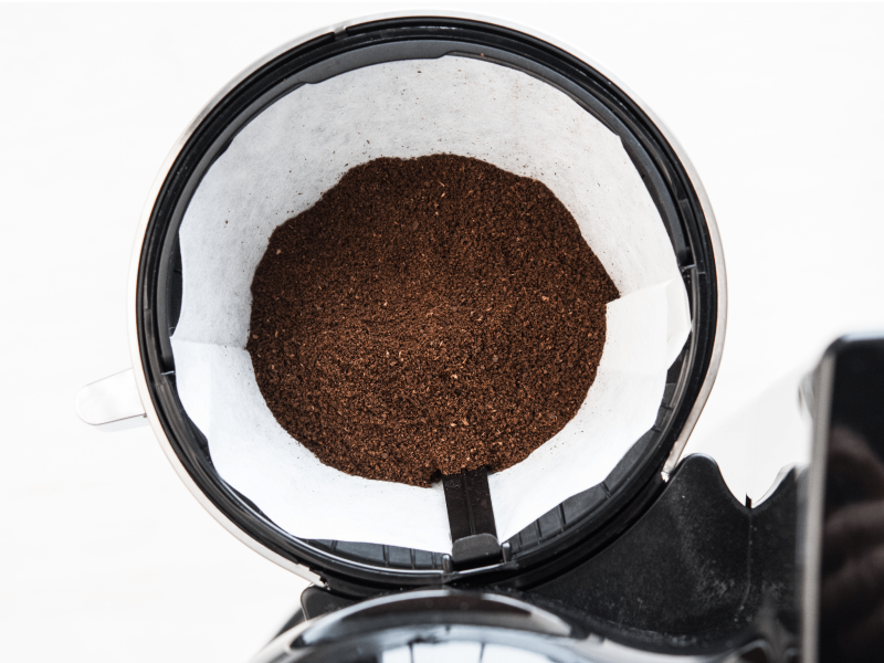 Fresh coffee beans in a coffee filter