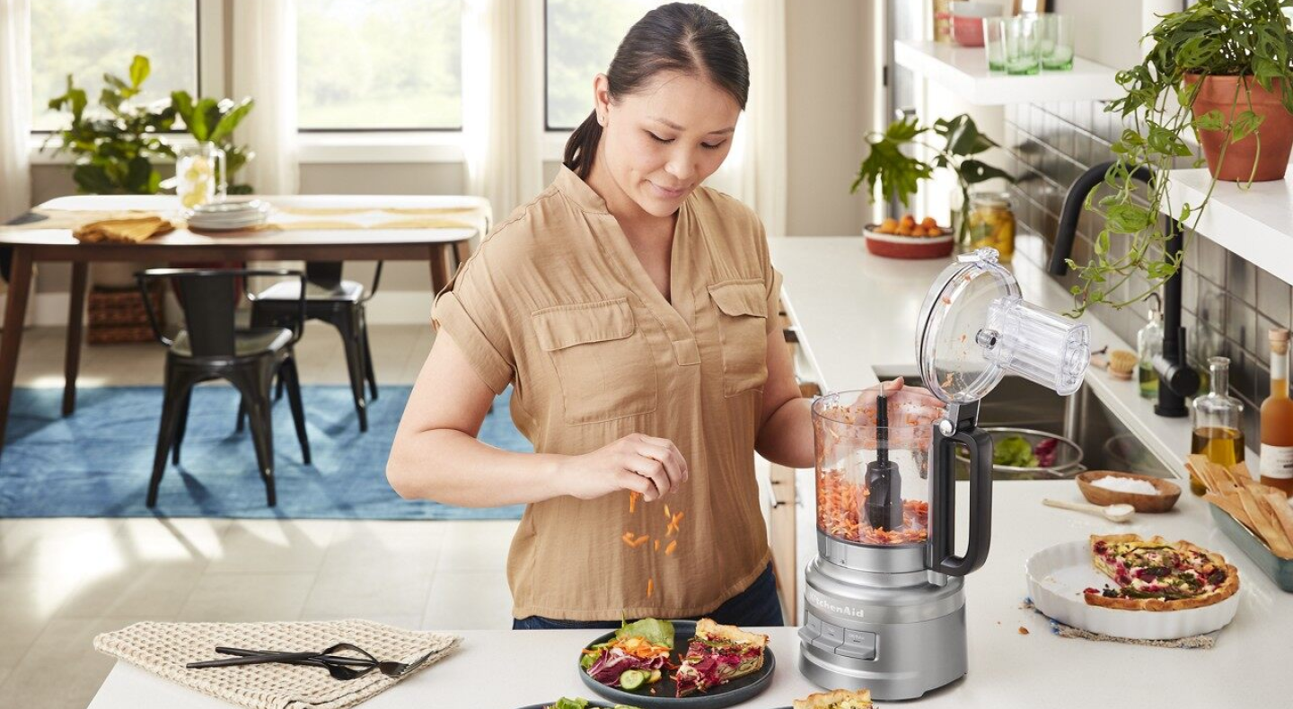 Person using KitchenAid® food processor
