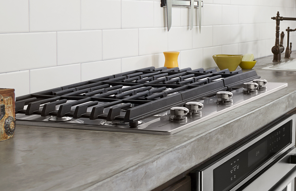 Gas cooktop on a cement countertop