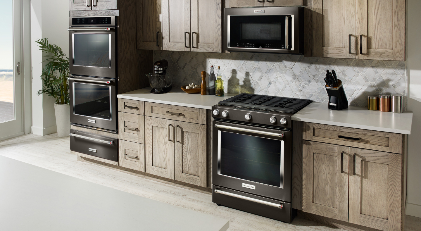 Black KitchenAid® slide-in range, microwave and double wall oven