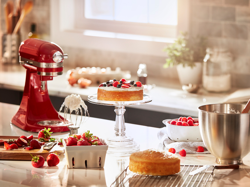 KitchenAid® stand mixer on a countertop with baked goods