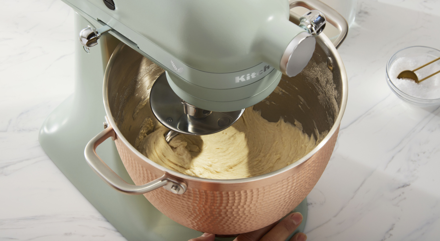 A stand mixer kneading dough