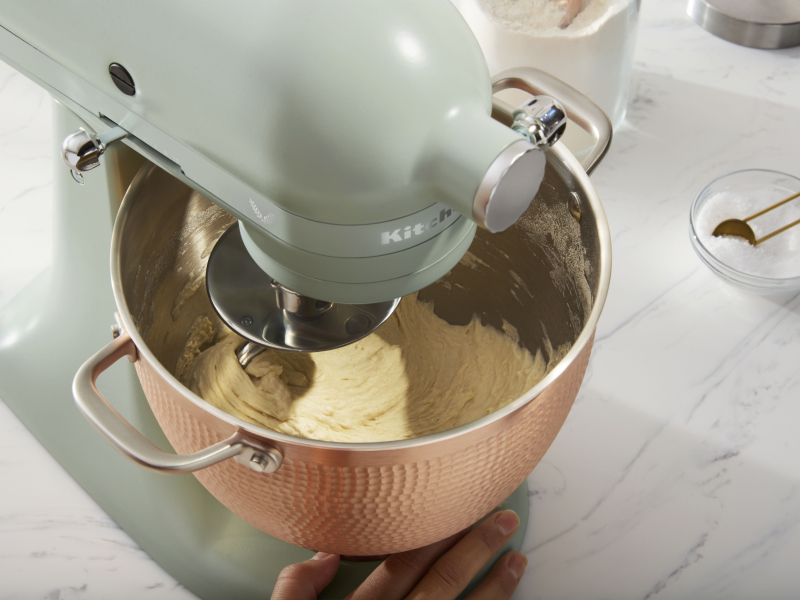 A stand mixer kneading dough