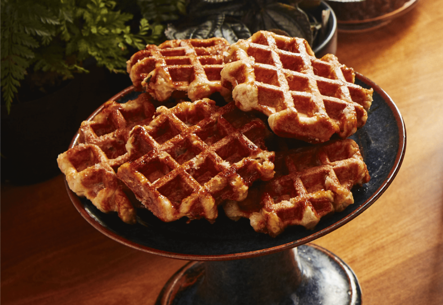 Waffles on a serving platter.