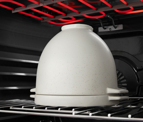KitchenAid® Bread Bowl in oven baking bread
