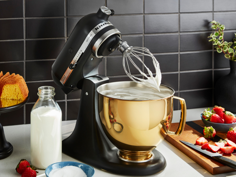 Stand mixer whisking something creamy