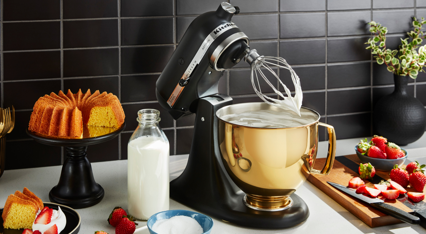 Stand mixer whisking something creamy