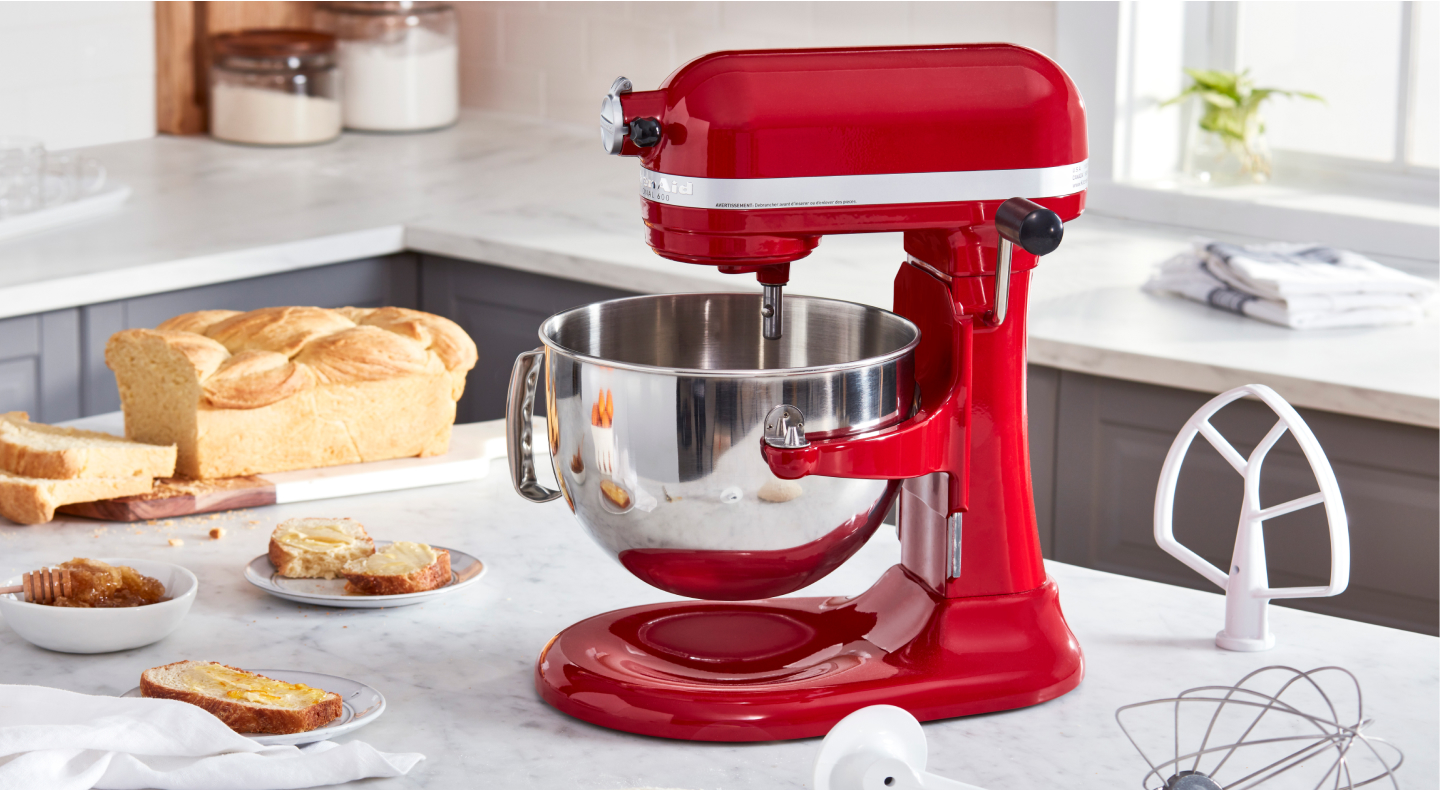 Stand mixer on the counter with bread and beater accessory