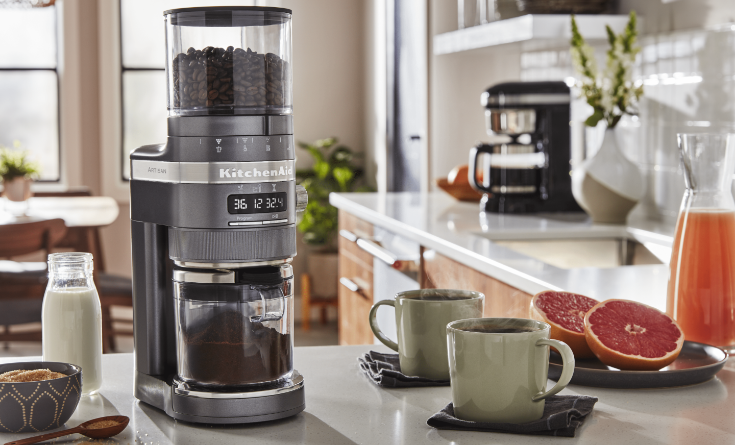 KitchenAid® Burr Grinder with 2 green coffee mugs