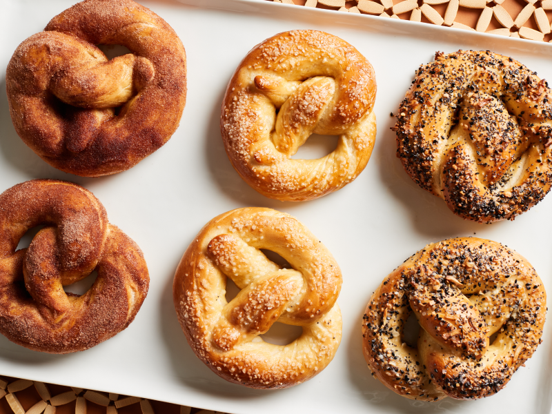Close-up of homemade soft pretzels in a variety of flavors
