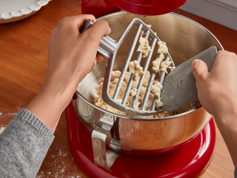  Person making pastry with pastry beater