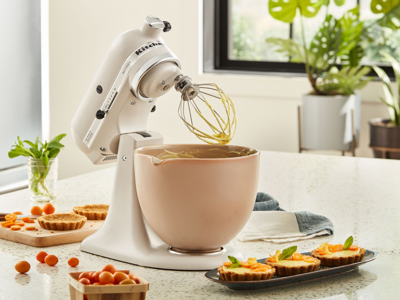  KitchenAid® stand mixer next to mini-quiches on countertop