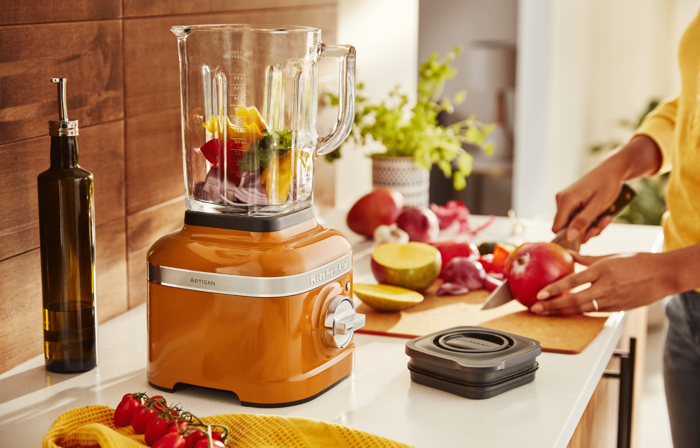 KitchenAid® blender with sliced vegetables inside