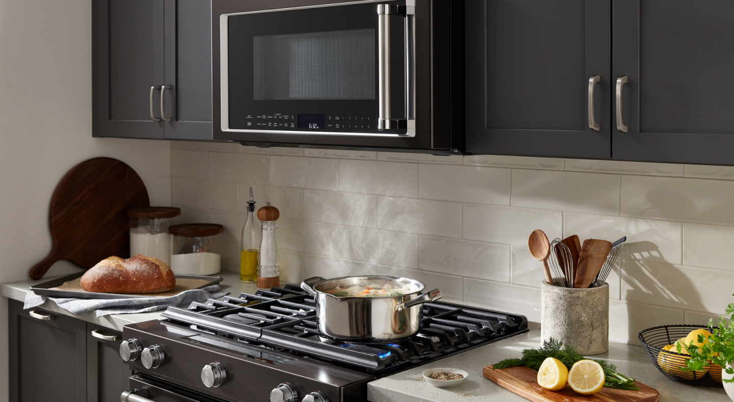 Pot simmering on a KitchenAid® gas range