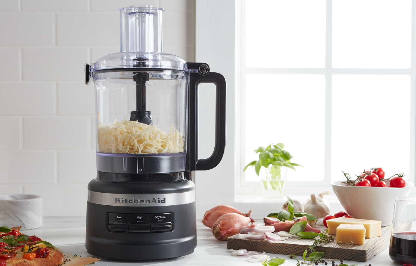 A black KitchenAid® food processor.