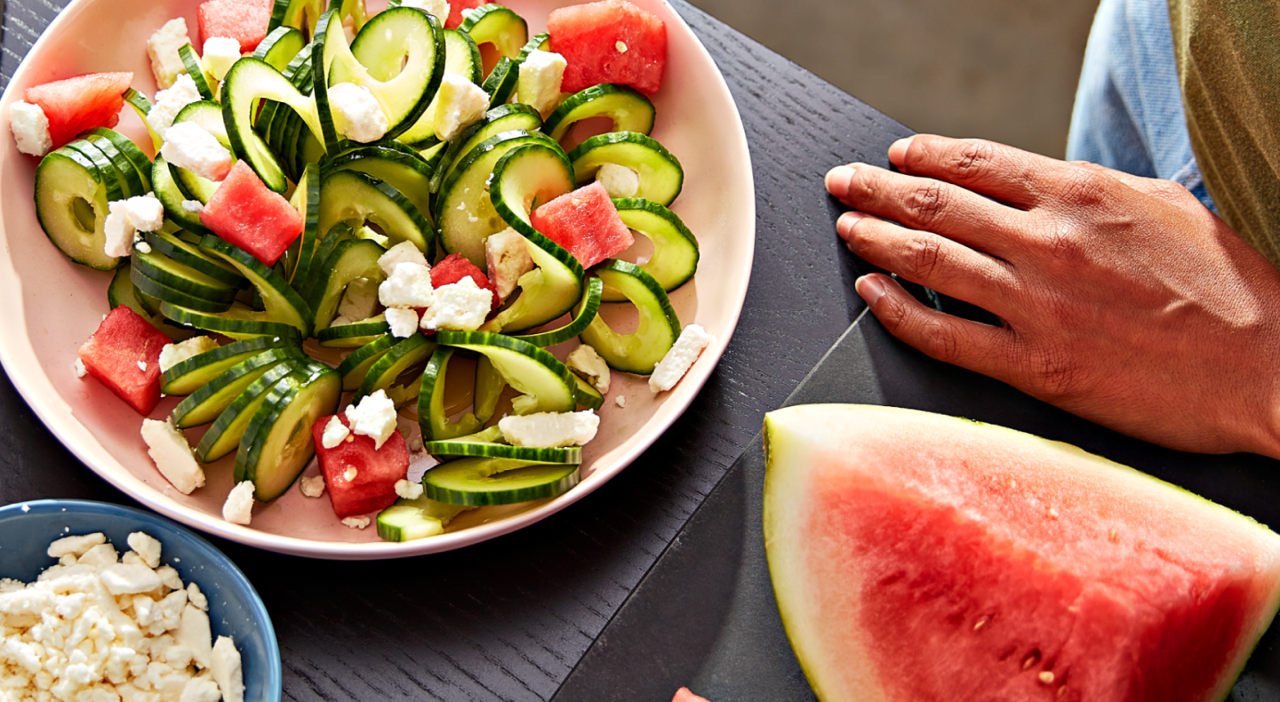 Salad with spiralized veggie noodles, watermelon and feta