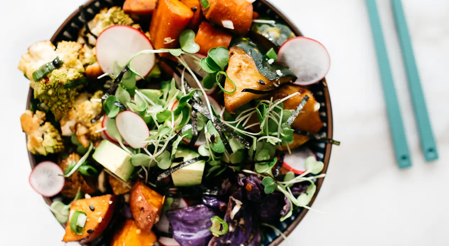 Grain bowl with sweet potatoes and mixed vegetables