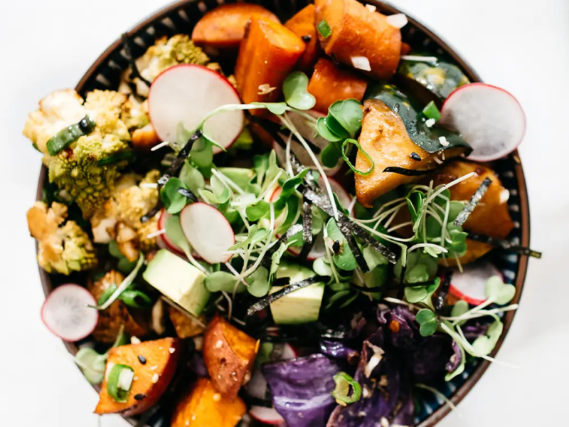Grain bowl with sweet potatoes and mixed vegetables