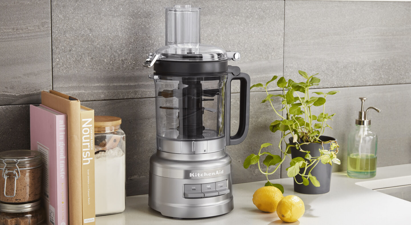 KitchenAid® food processor on a modern kitchen counter.