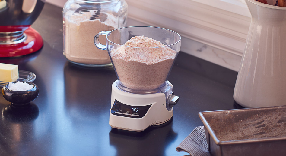  Flour in a measuring cup on a scale