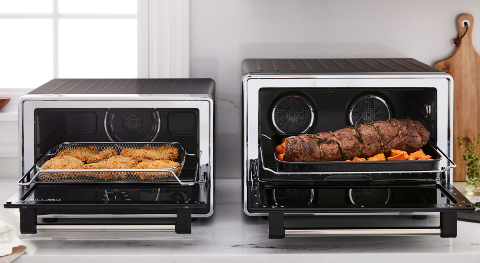 Two countertop ovens side-by-side featuring different meals