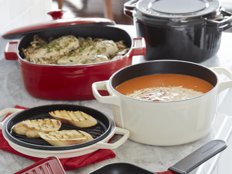 White dutch oven with soup inside