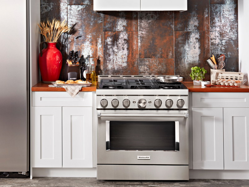 Stainless steel KitchenAid® gas range and side-by-side refrigerator 