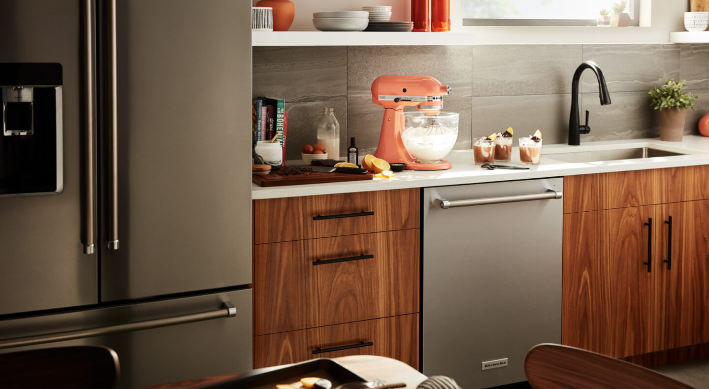 Orange KitchenAid® stand mixer on countertop