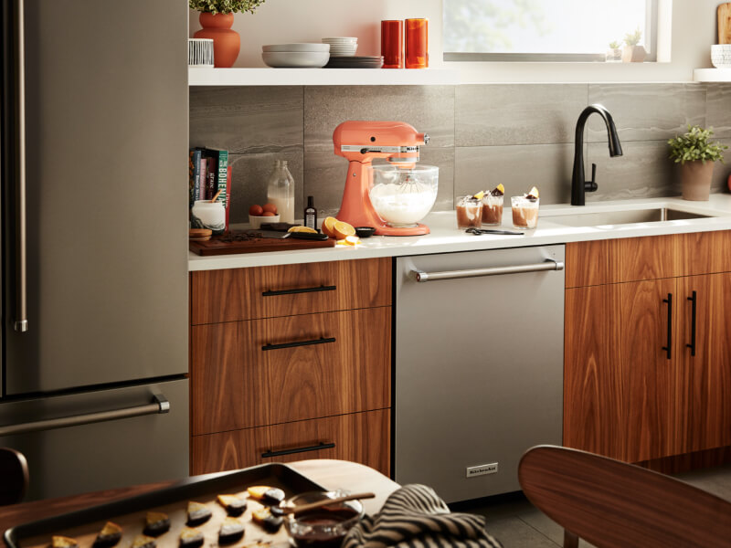 Orange KitchenAid® stand mixer on countertop