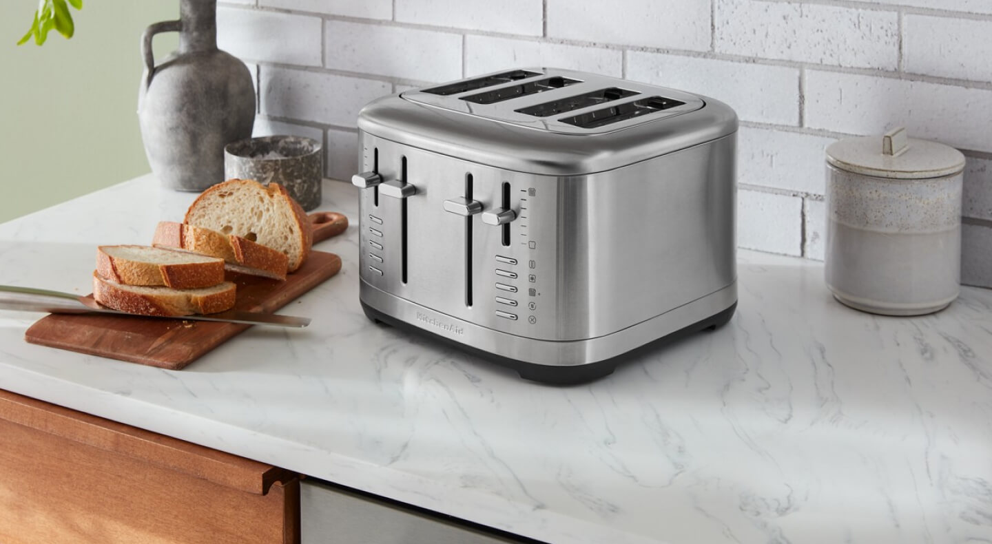 Stainless steel KitchenAid® 4-slice toaster on granite countertop