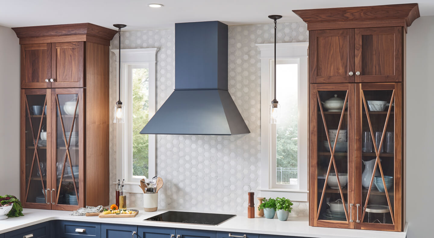 Wall-mount range hood over an electric cooktop