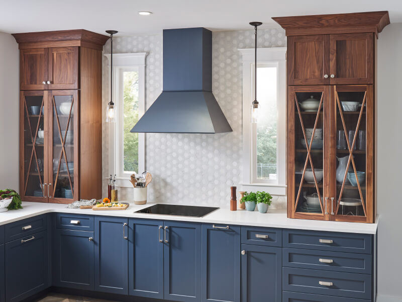 Wall-mount range hood over an electric cooktop