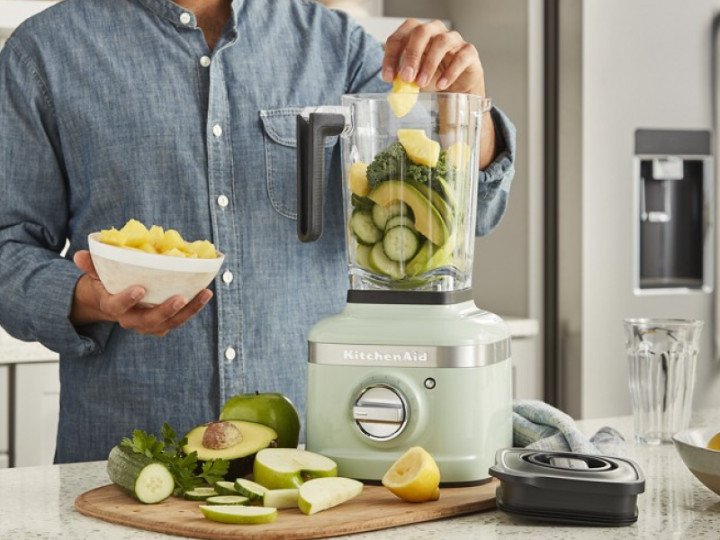 Person using KitchenAid® countertop blender