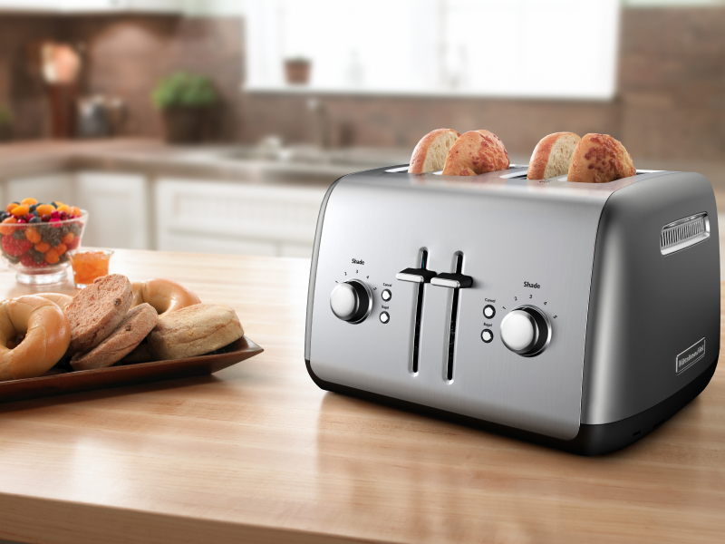 Bagels made with a KitchenAid® 4-slice toaster on butcher block countertop