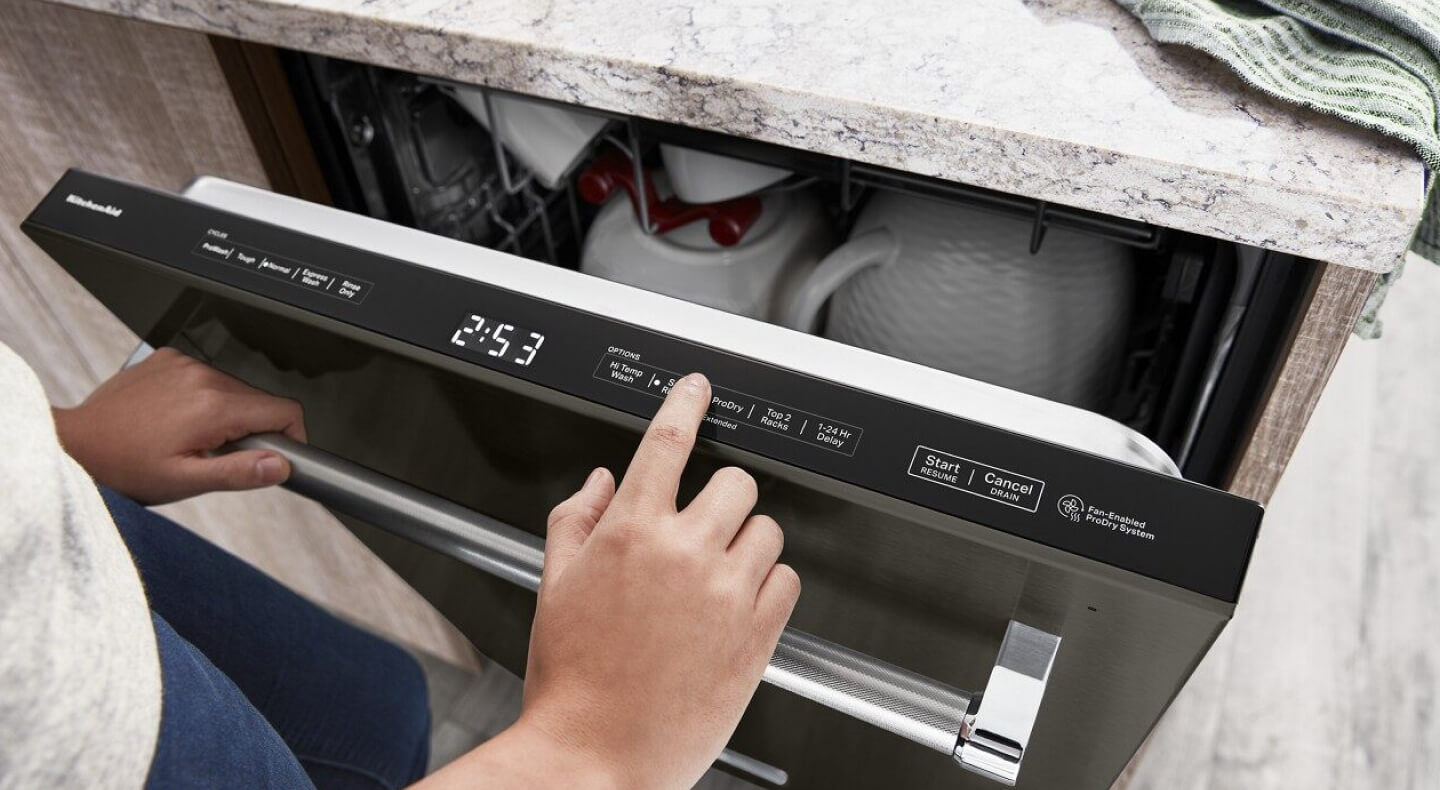 Close up of black KitchenAid® top control dishwasher door