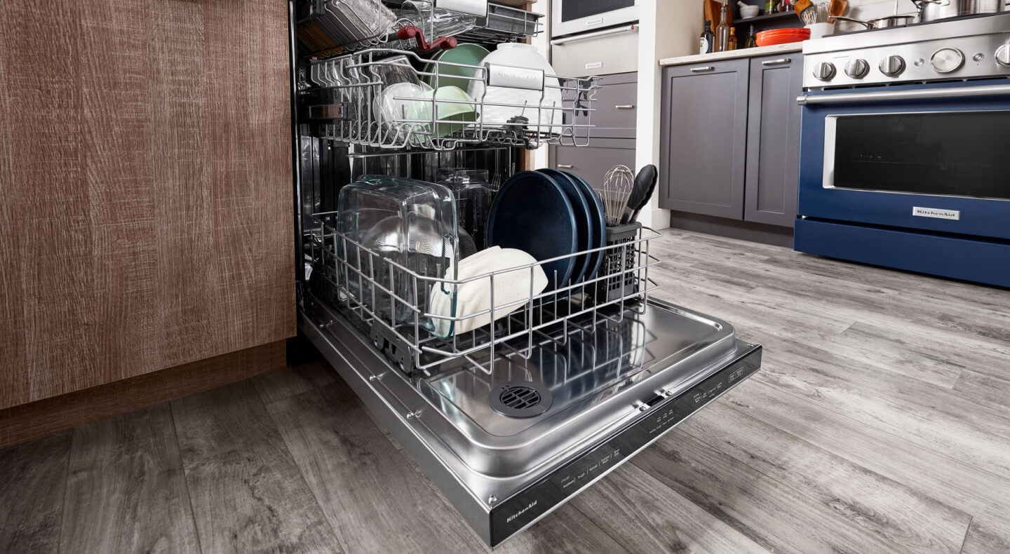 A full open dishwasher