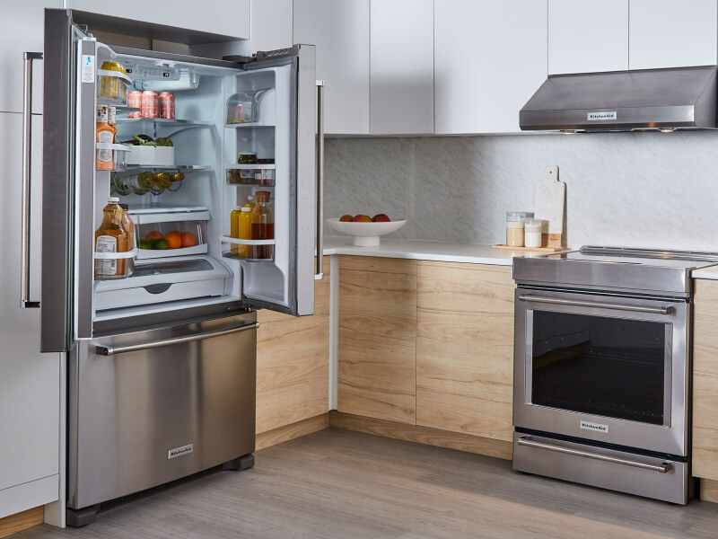 KitchenAid® french door refrigerator open to show contents