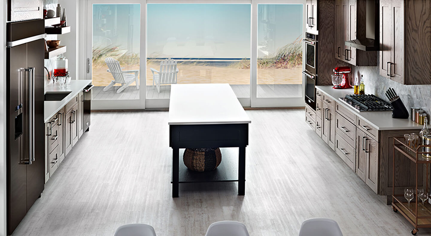 A spacious galley kitchen with an island