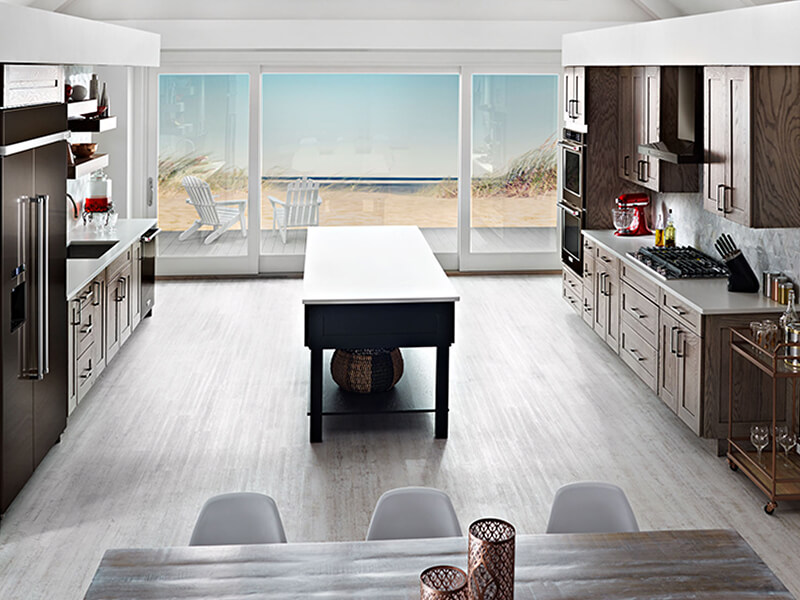 A spacious galley kitchen with an island