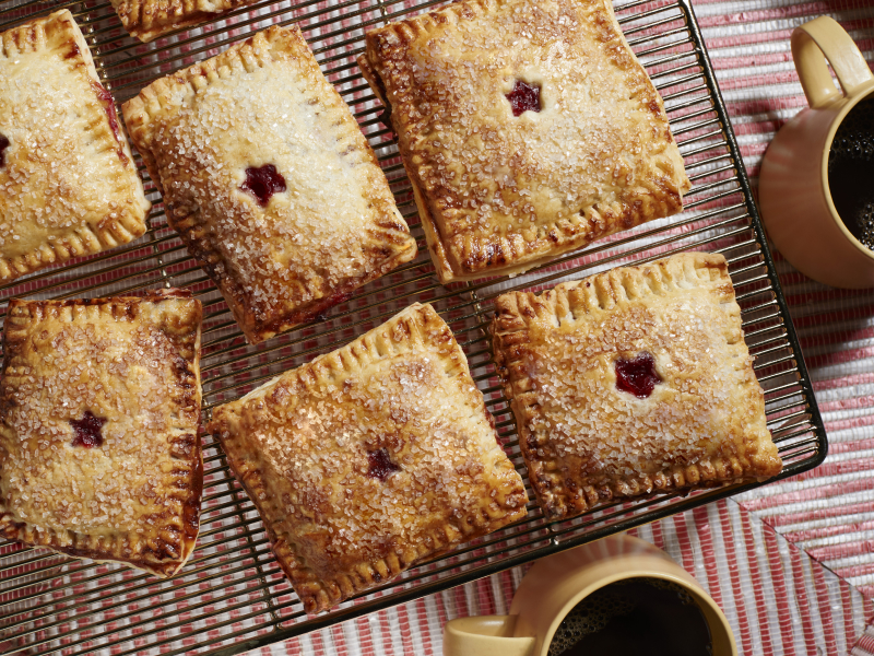 Air-fried strawberry hand pies on a baking rack