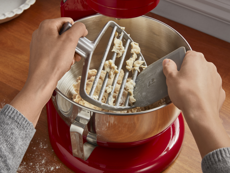 Dough being removed from a pastry beater