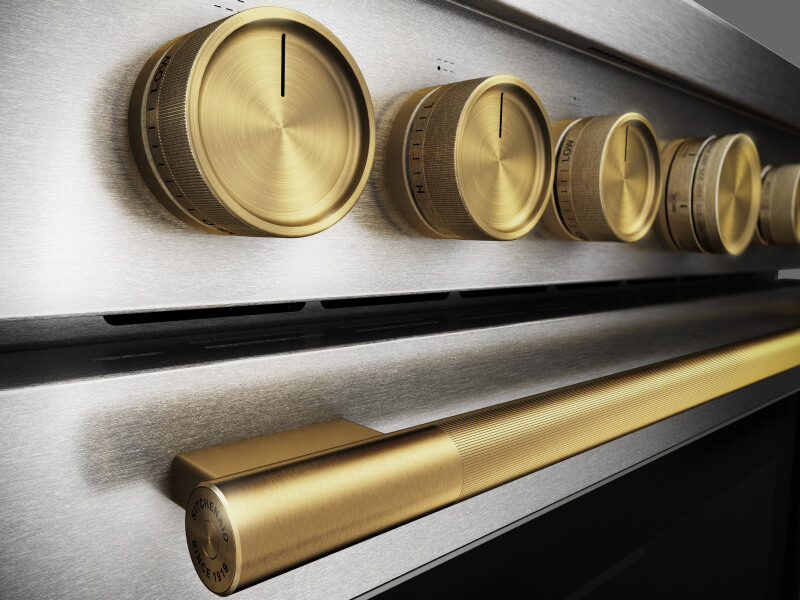 Close-up of range temperature control knobs